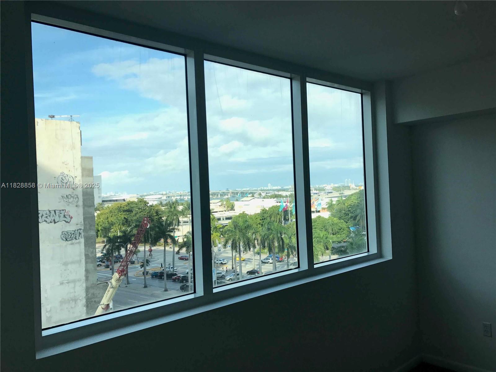 244 Biscayne Boulevard, Unit 608 Miami, FL 33132 - Photo 25 of 25 a view of sky from window