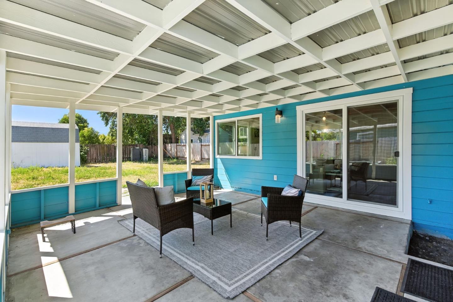 3612 Los Flores Avenue Concord, CA 94519 - Photo 42 of 65 a view of a patio with table and chairs and potted plants