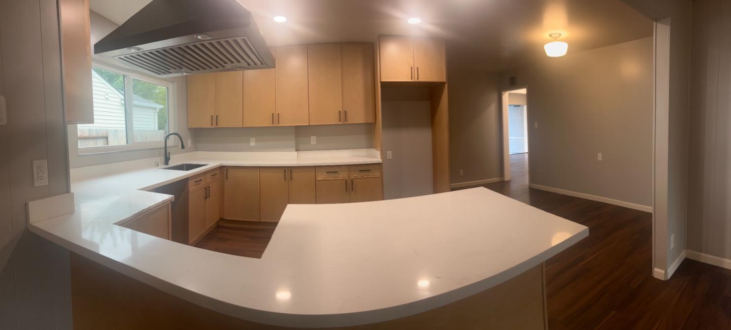 3612 Los Flores Avenue Concord, CA 94519 - Photo 61 of 65 a kitchen with stainless steel appliances granite countertop a sink a refrigerator and a stove