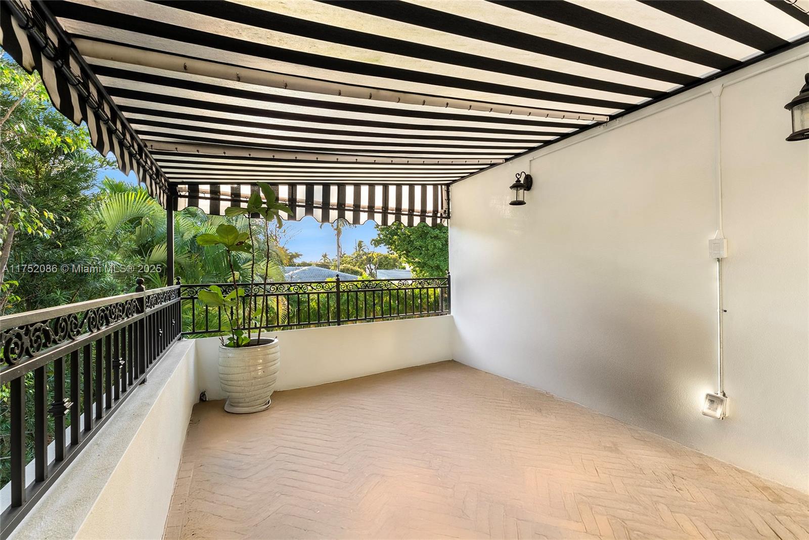 6146 Pine Tree Drive Miami Beach, FL 33140 - Photo 16 of 30 a view of a porch