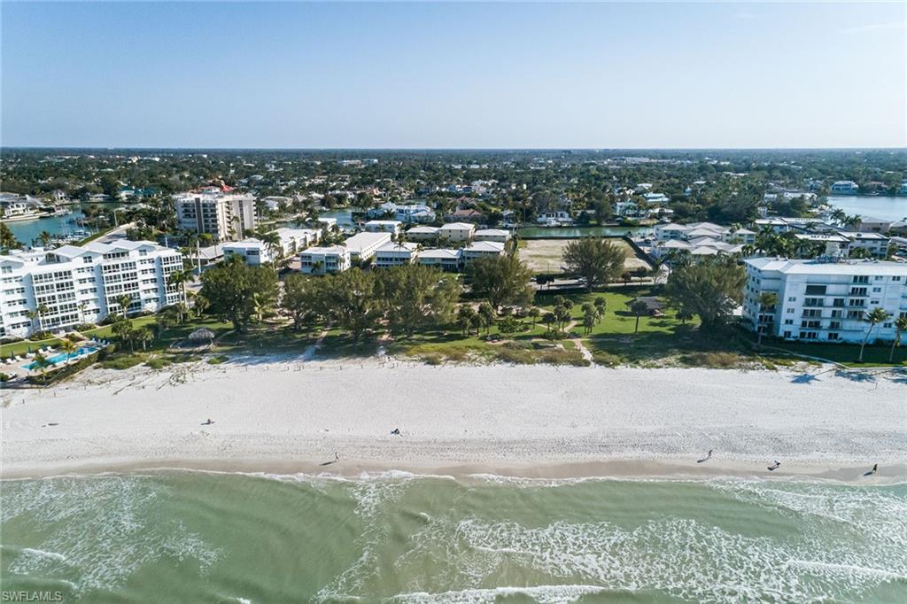 700 Bow Line Drive Naples, FL 34103 - Photo 15 of 18 an aerial view of residential houses with outdoor space and trees