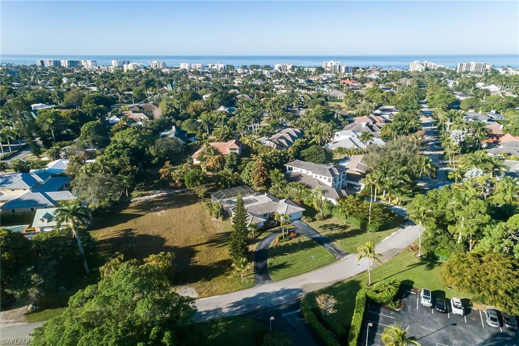 700 Bow Line Drive Naples, FL 34103 - Photo 4 of 18 an aerial view of residential houses with outdoor space