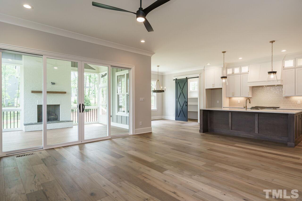 2609 Sanctuary Wds Lane Raleigh, NC 27606 - Photo 2 of 38 a large kitchen with a lot of counter space and stainless steel appliances