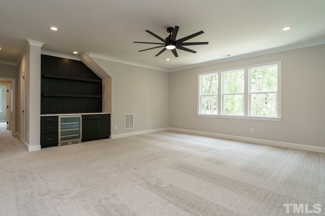 2609 Sanctuary Wds Lane Raleigh, NC 27606 - Photo 31 of 38 an empty room with windows and closet