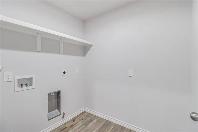 a view of a house with a yard and porch