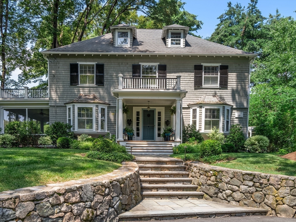 15 Training Field Road Wayland, MA 01778 - Photo 4 of 37 a front view of a house with a garden