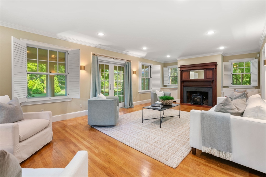 15 Training Field Road Wayland, MA 01778 - Photo 10 of 37 a living room with furniture and a fireplace