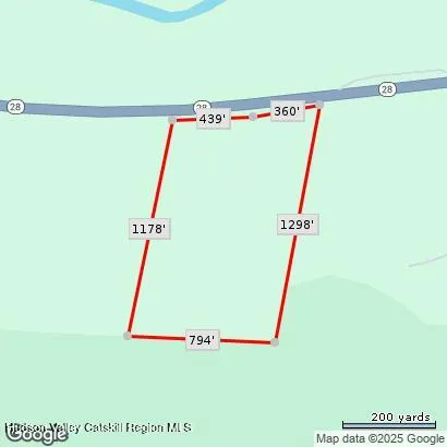 a view of a room with and white wooden floor