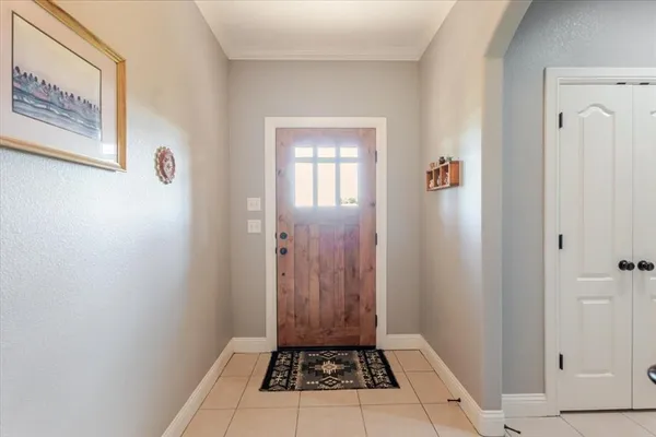 a view of a hallway to a bedroom