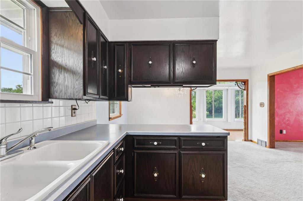 1509 Edmon Road Avonmore, PA 15618 - Photo 14 of 49 a kitchen with a sink and a stove