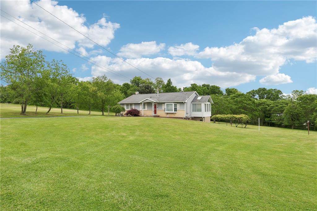 1509 Edmon Road Avonmore, PA 15618 - Photo 41 of 49 a view of a house with a big yard