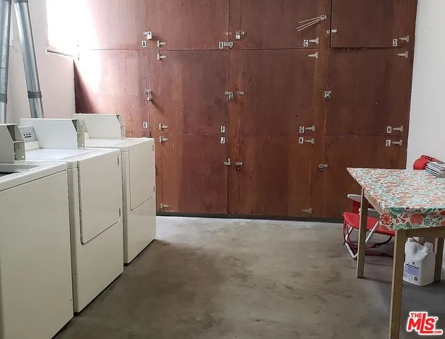 a bathroom with a sink vanity and a mirror