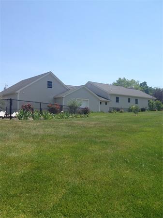 4 Randall Road Berlin, MA 01503 - Photo 13 of 13 a view of a big house with a big yard and large trees