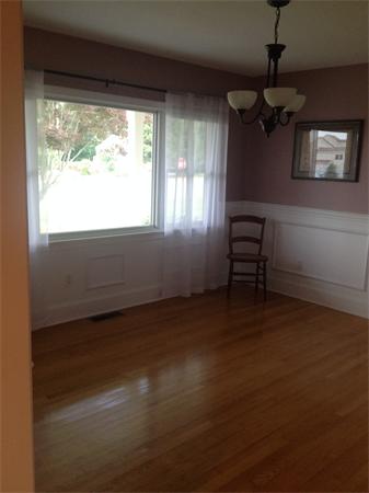 4 Randall Road Berlin, MA 01503 - Photo 5 of 13 a view of empty room with wooden floor and fan
