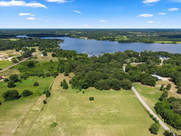 a view of a swimming pool and lake view