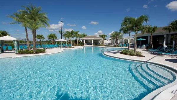 a view of a backyard with a patio