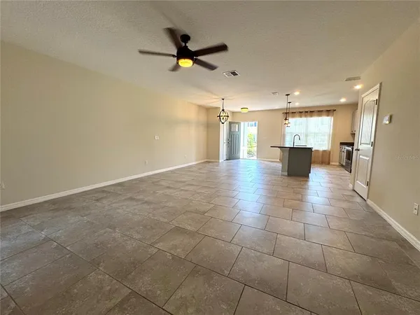 a view of a electric appliances and chandelier fan