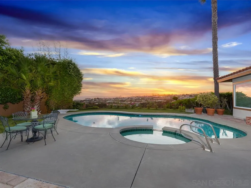 5486 Soledad Road La Jolla, CA 92037 - Photo 2 of 25 a view of swimming pool with outdoor seating and plants
