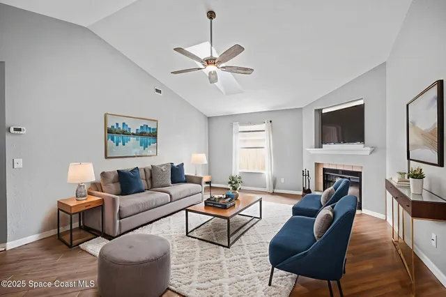 a bedroom with a large bed and a couch