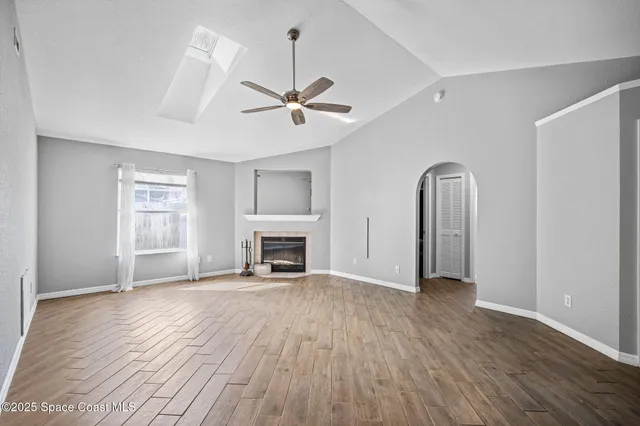 a bathroom with a double vanity sink mirror and shower