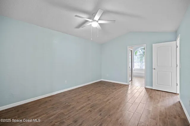 a view of a lake with a yard