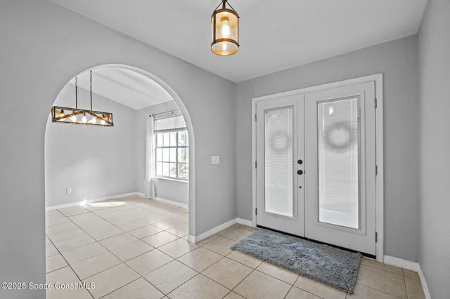 a open kitchen with cabinets and stainless steel appliances