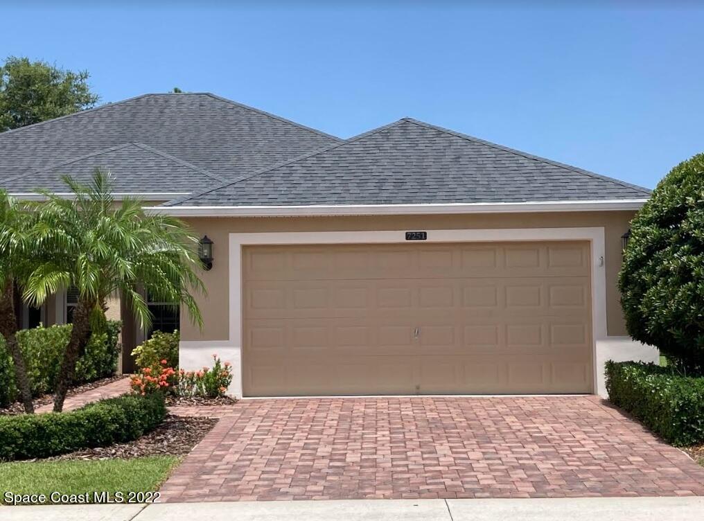7251 Ralston Street Melbourne, FL 32940 - Photo 1 of 35 a view of a house with a yard