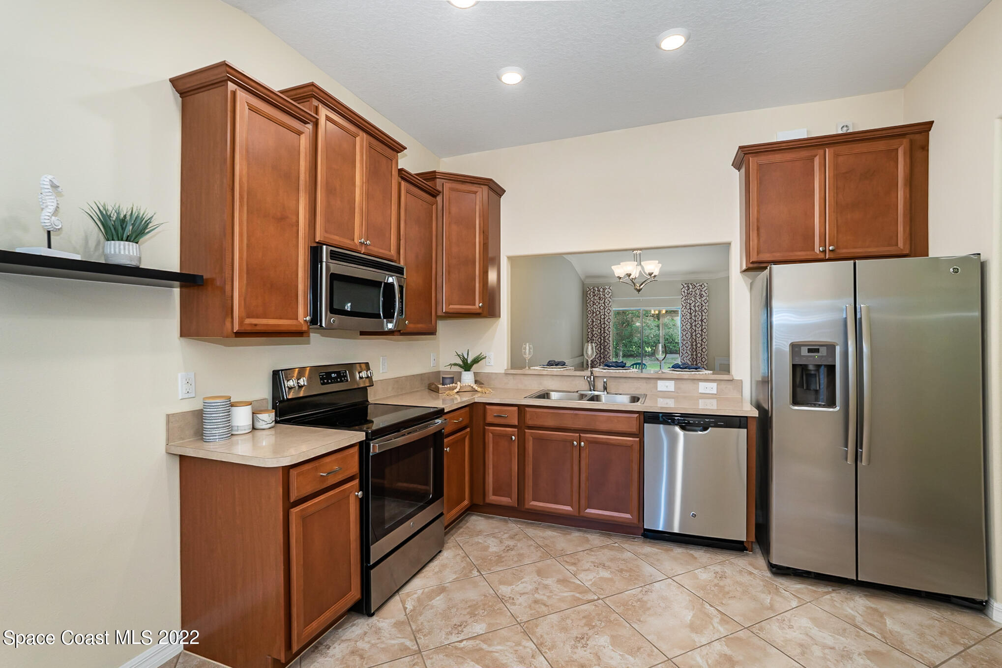 7251 Ralston Street Melbourne, FL 32940 - Photo 7 of 35 Kitchen - GE SS Appliances
