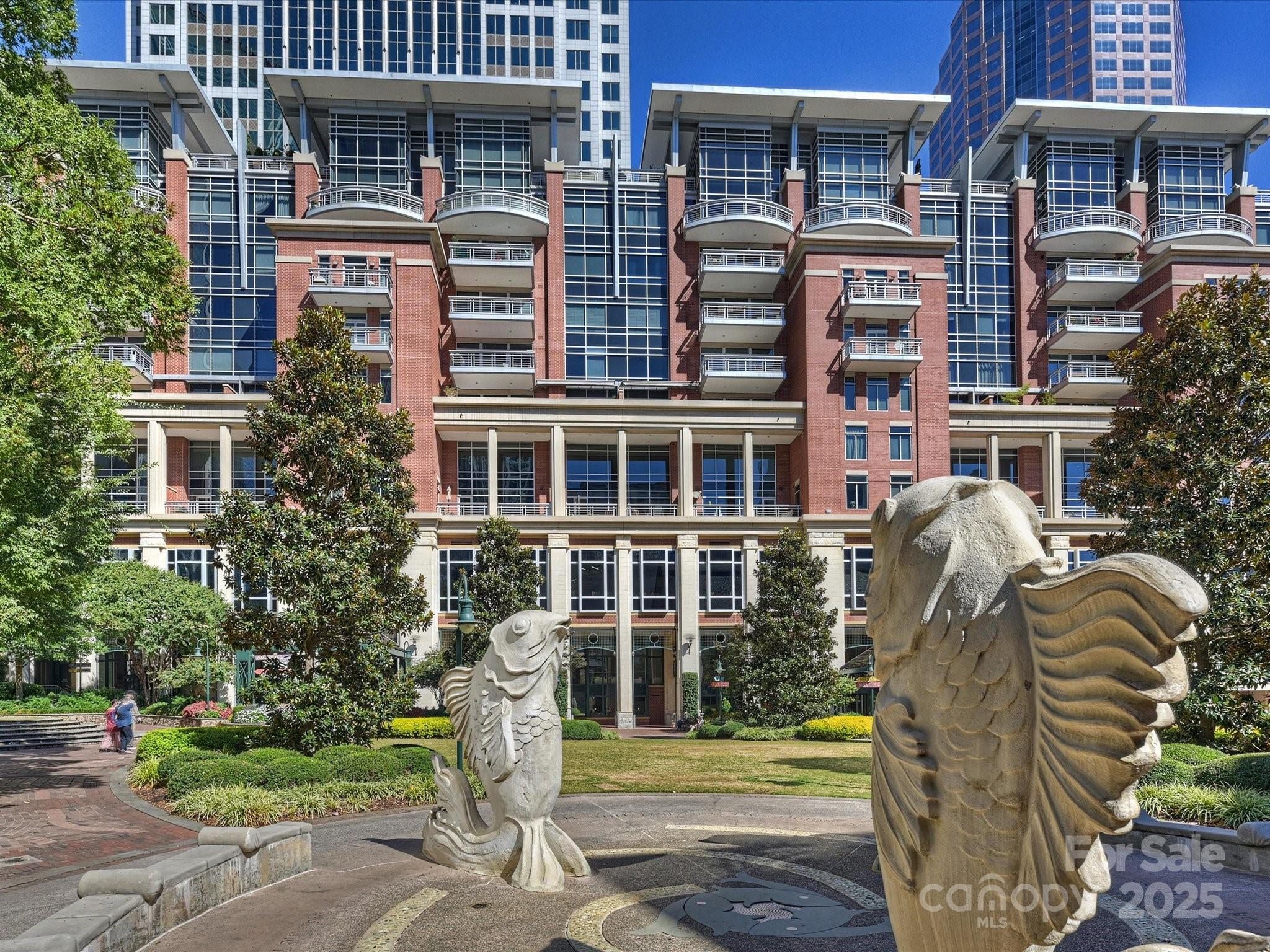 435 South Tryon Street, Unit 307 Charlotte, NC 28202 - Photo 3 of 48 a front view of a multi story building