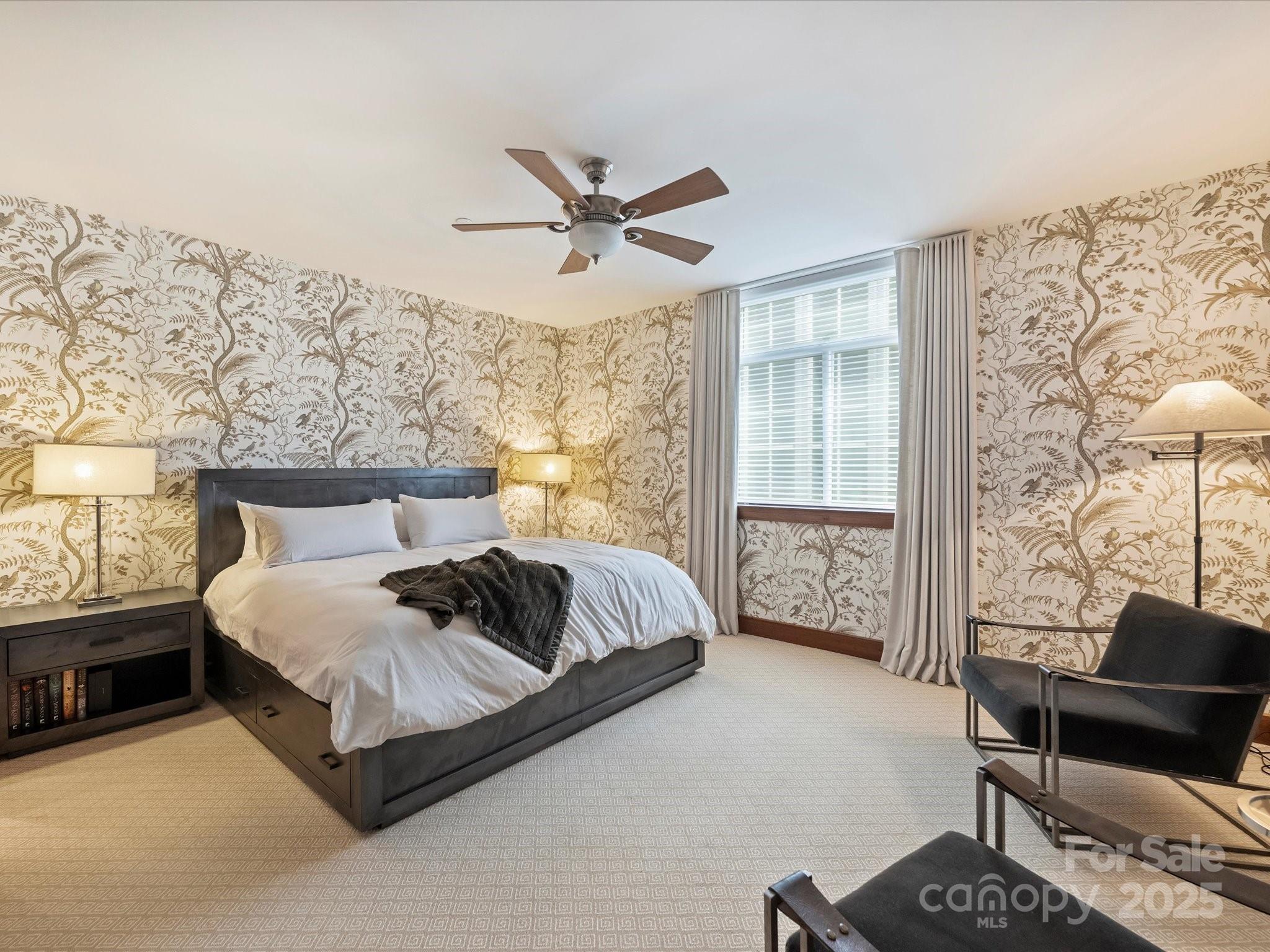 435 South Tryon Street, Unit 307 Charlotte, NC 28202 - Photo 31 of 48 a bedroom with a bed and a window