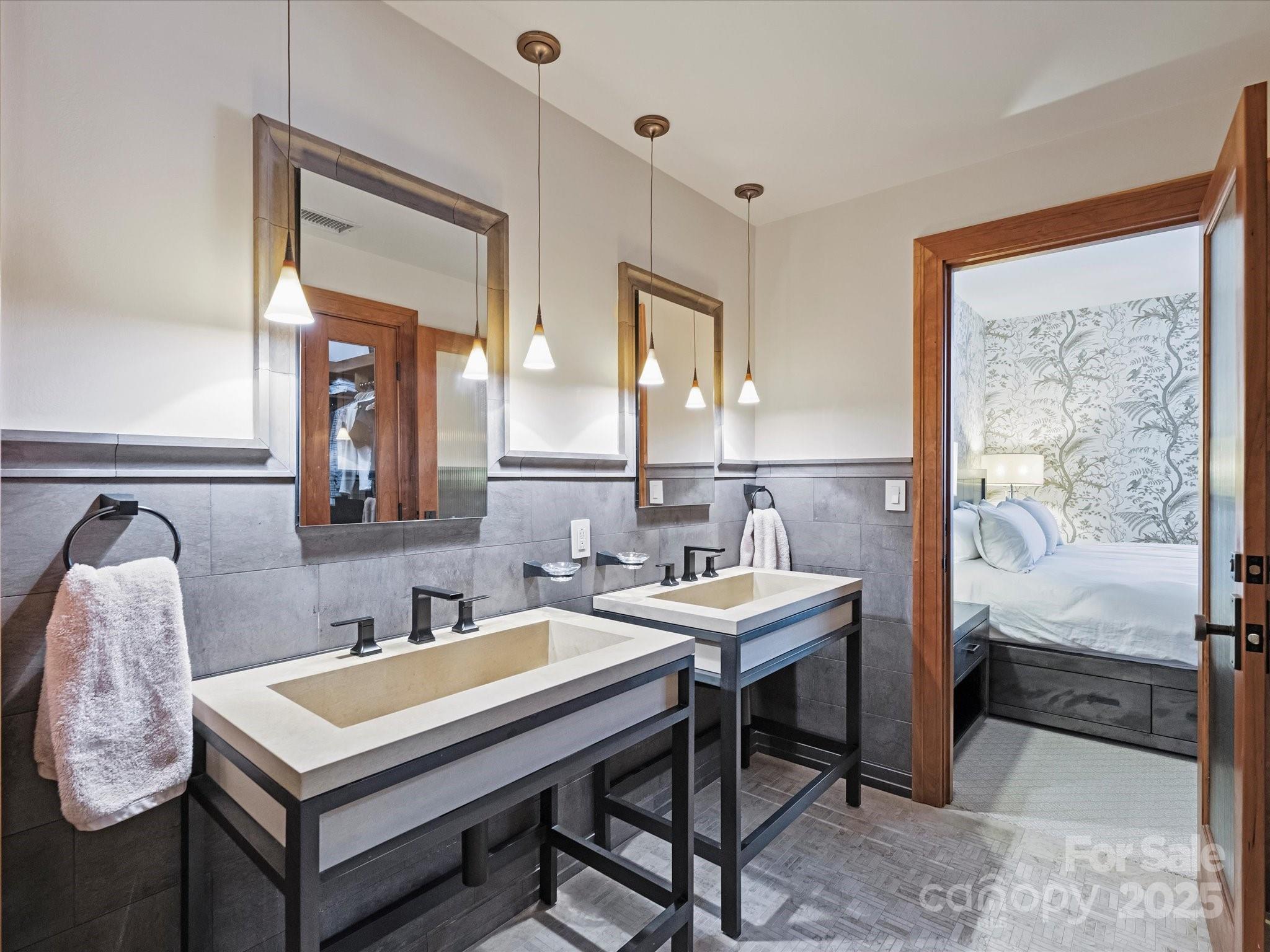 435 South Tryon Street, Unit 307 Charlotte, NC 28202 - Photo 36 of 48 a view of a kitchen area with furniture and window