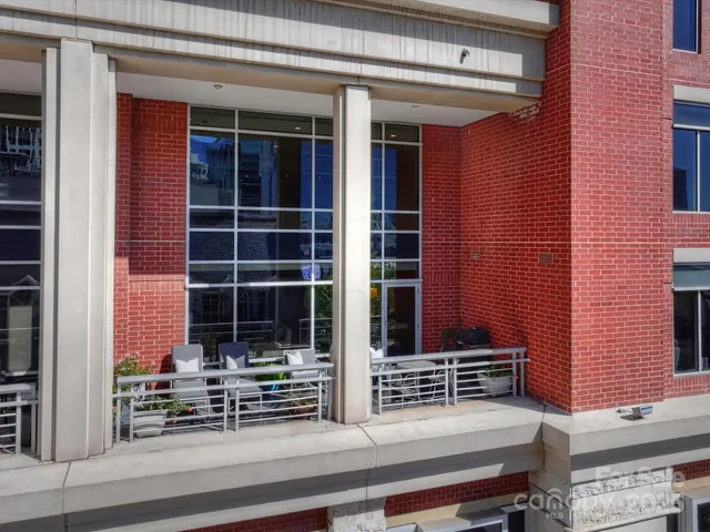 a view of house with large windows