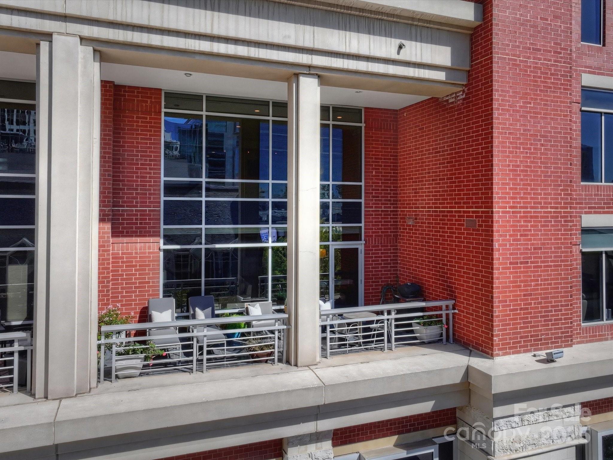 435 South Tryon Street, Unit 307 Charlotte, NC 28202 - Photo 45 of 48 a view of house with large windows