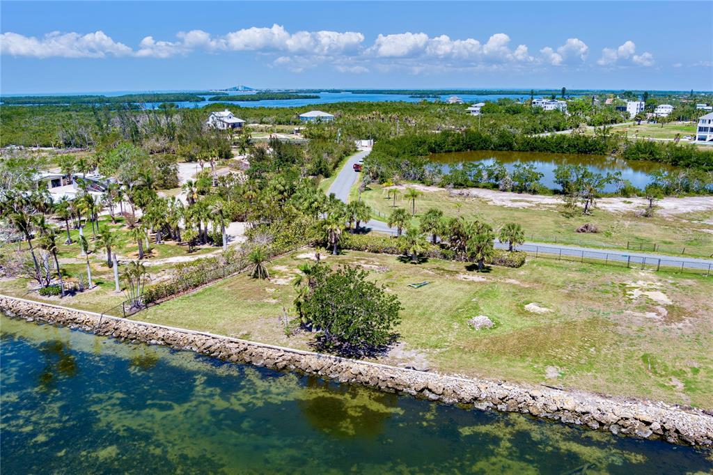 285 Horseshoe Loop Road Terra Ceia, FL 34250 - Photo 7 of 16 a view of a lake with houses