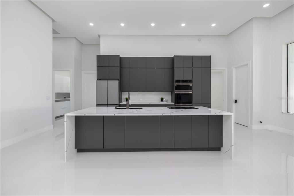 6 Rockne Lane Palm Coast, FL 32164 - Photo 14 of 24 a living room with stainless steel appliances kitchen island a large counter top