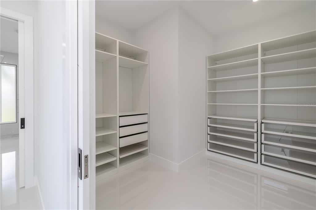 6 Rockne Lane Palm Coast, FL 32164 - Photo 24 of 24 a view of walk in closet with empty racks