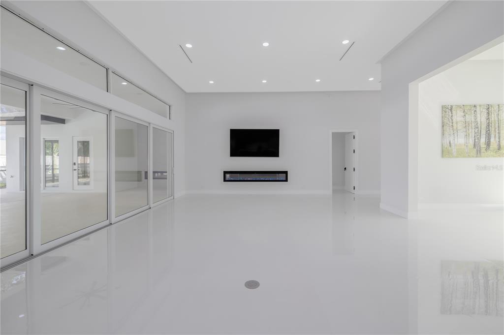 6 Rockne Lane Palm Coast, FL 32164 - Photo 10 of 24 a view of a livingroom with a flat screen tv