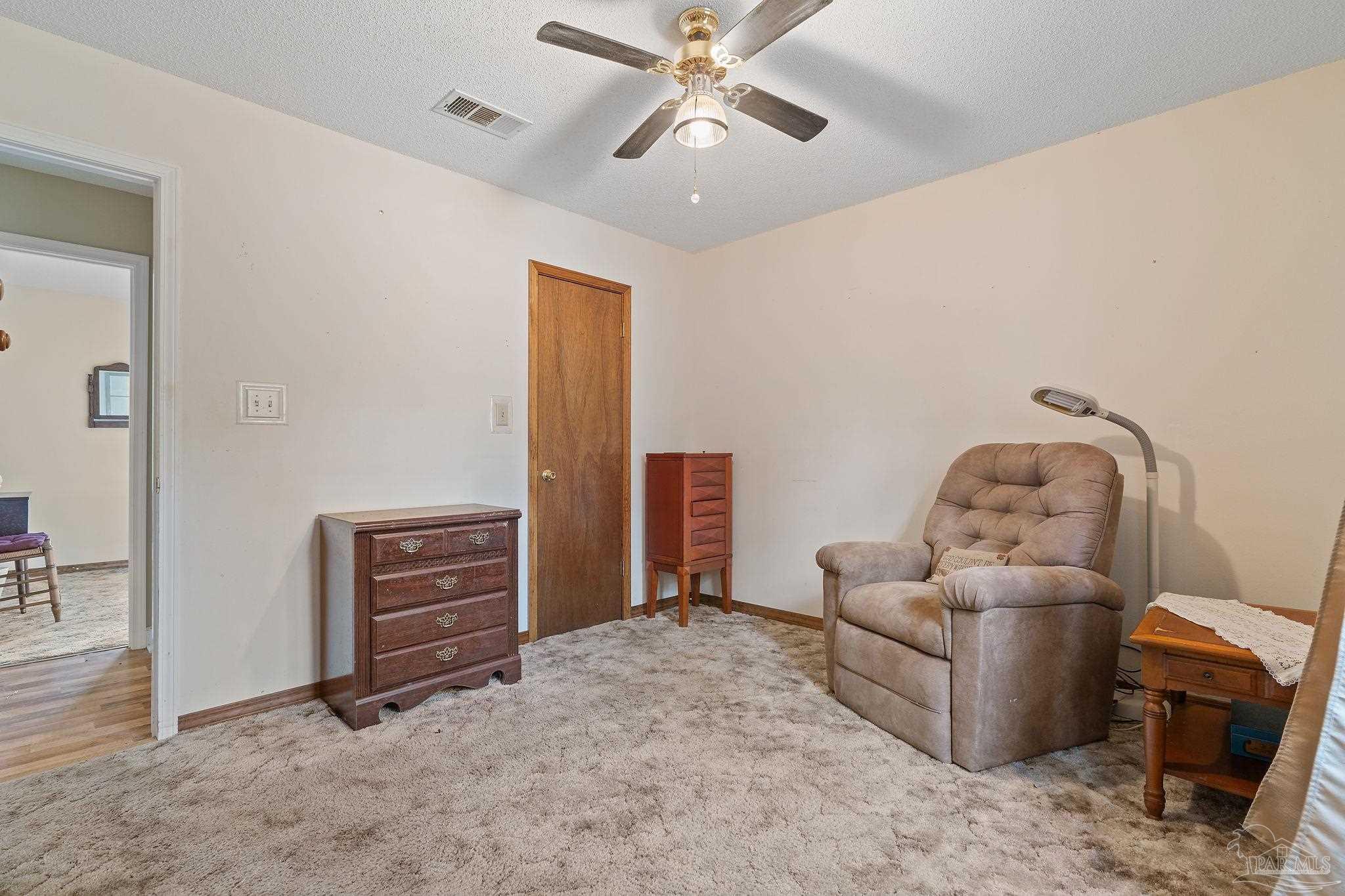 2329 Camors Road Jay, FL 32565 - Photo 20 of 28 a living room with furniture