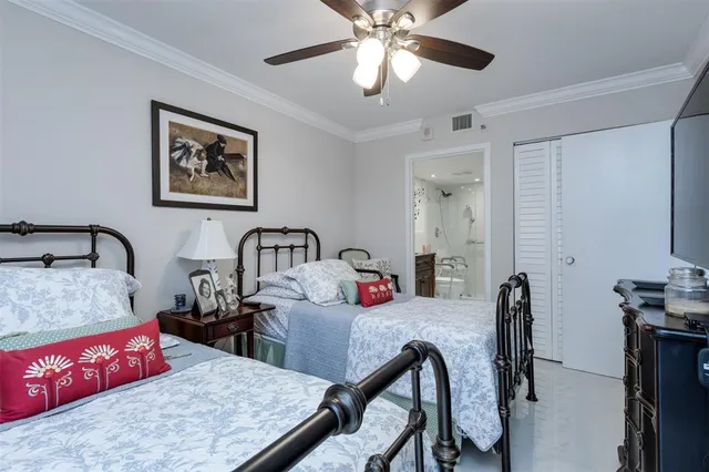 a living room with furniture fireplace and a large window