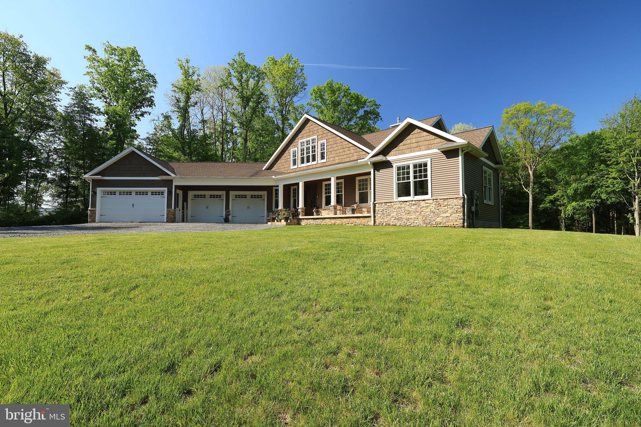 518 Two Mile Road Howard, PA 16841 - Photo 84 of 84 a front view of a house with a garden