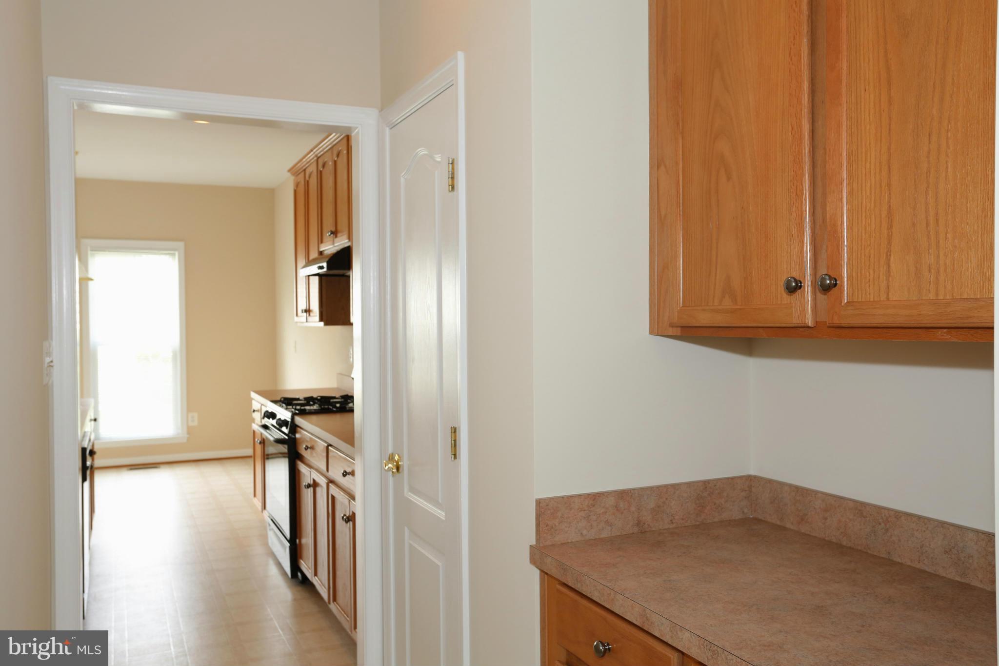 23847 Burdette Forest Road Clarksburg, MD 20871 - Photo 11 of 24 From Butler's Pantry to Kitchen
