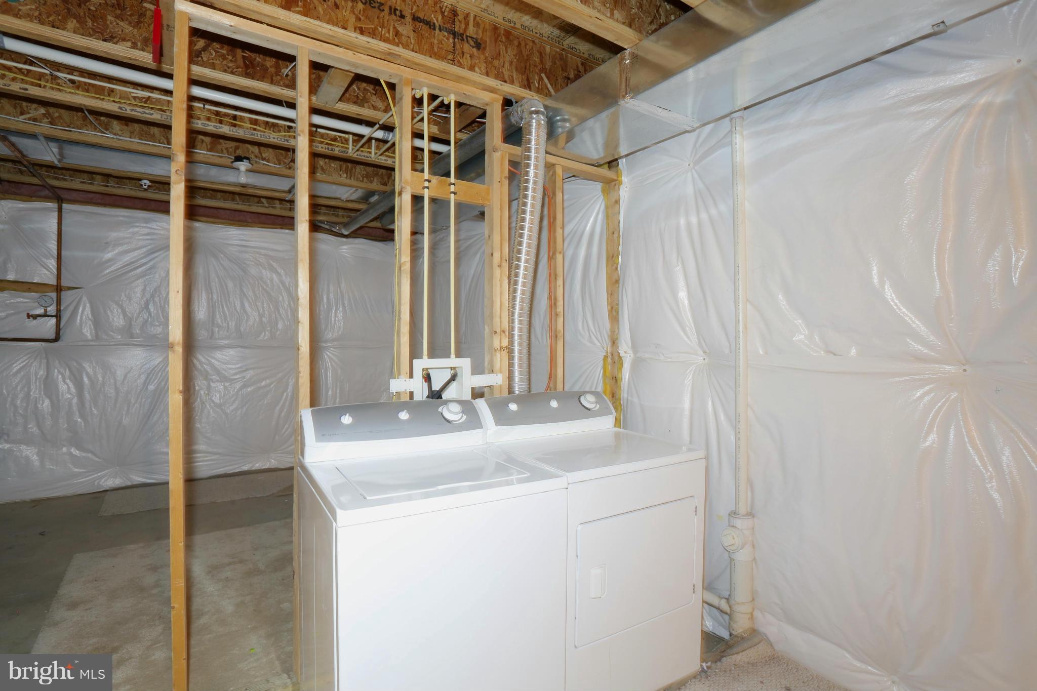 23847 Burdette Forest Road Clarksburg, MD 20871 - Photo 20 of 24 Washer & Dryer in unfinished basement