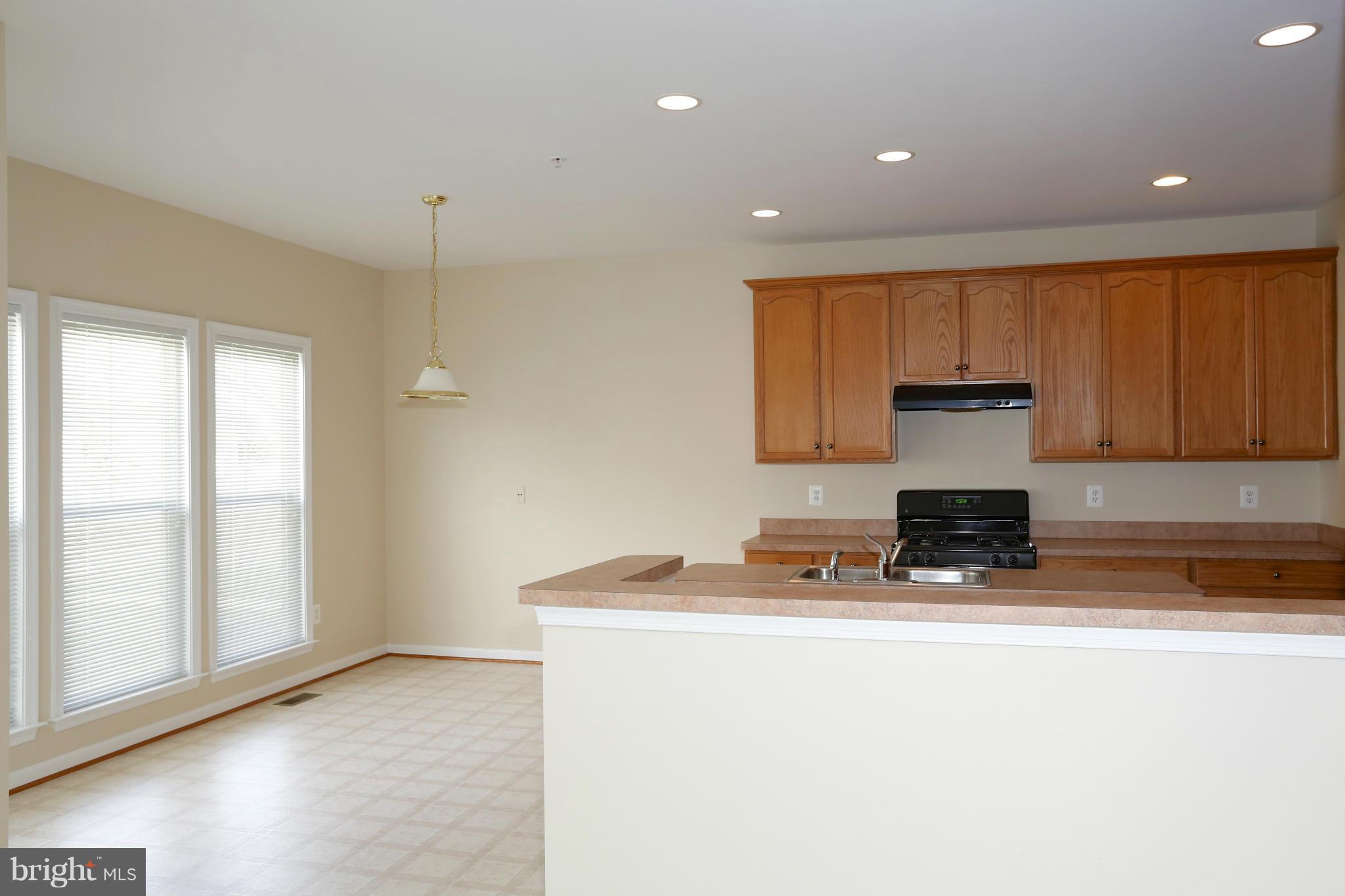 23847 Burdette Forest Road Clarksburg, MD 20871 - Photo 6 of 24 Kitchen as seen from family room