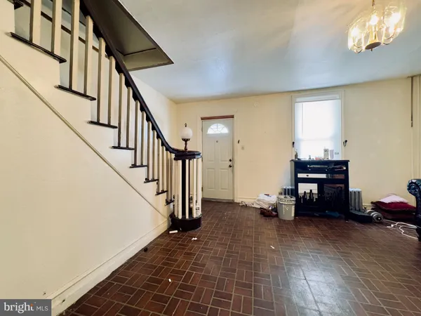 a view of livingroom with furniture and stairs