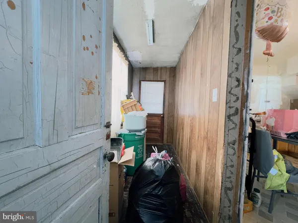 a bathroom with a toilet a sink and a window