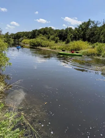 a view of a road with an ocean view