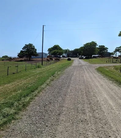 a view of a road with a play ground