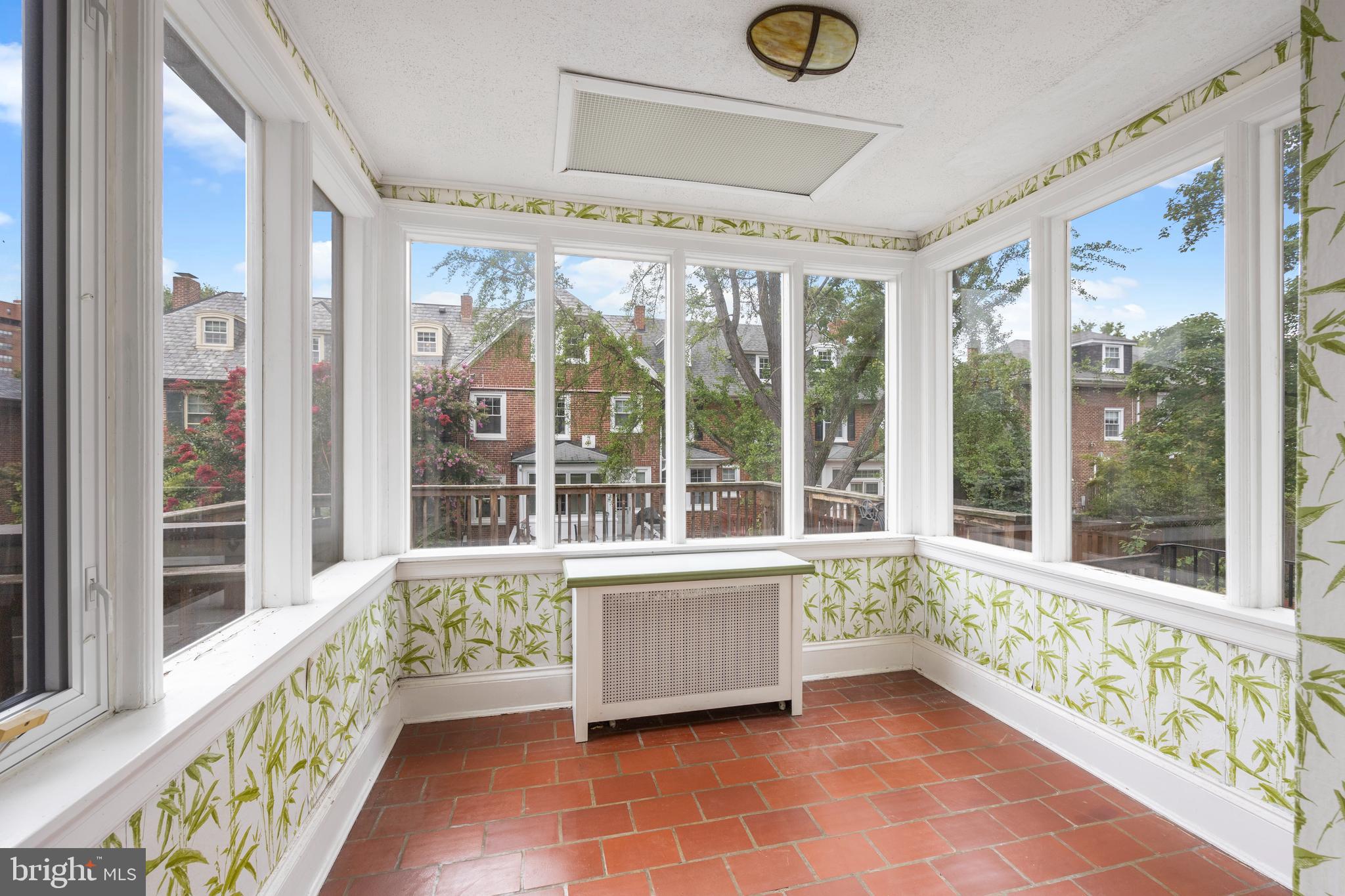 3936 Cloverhill Road Baltimore, MD 21218 - Photo 14 of 37 a view of an entryway with wooden floor and windows