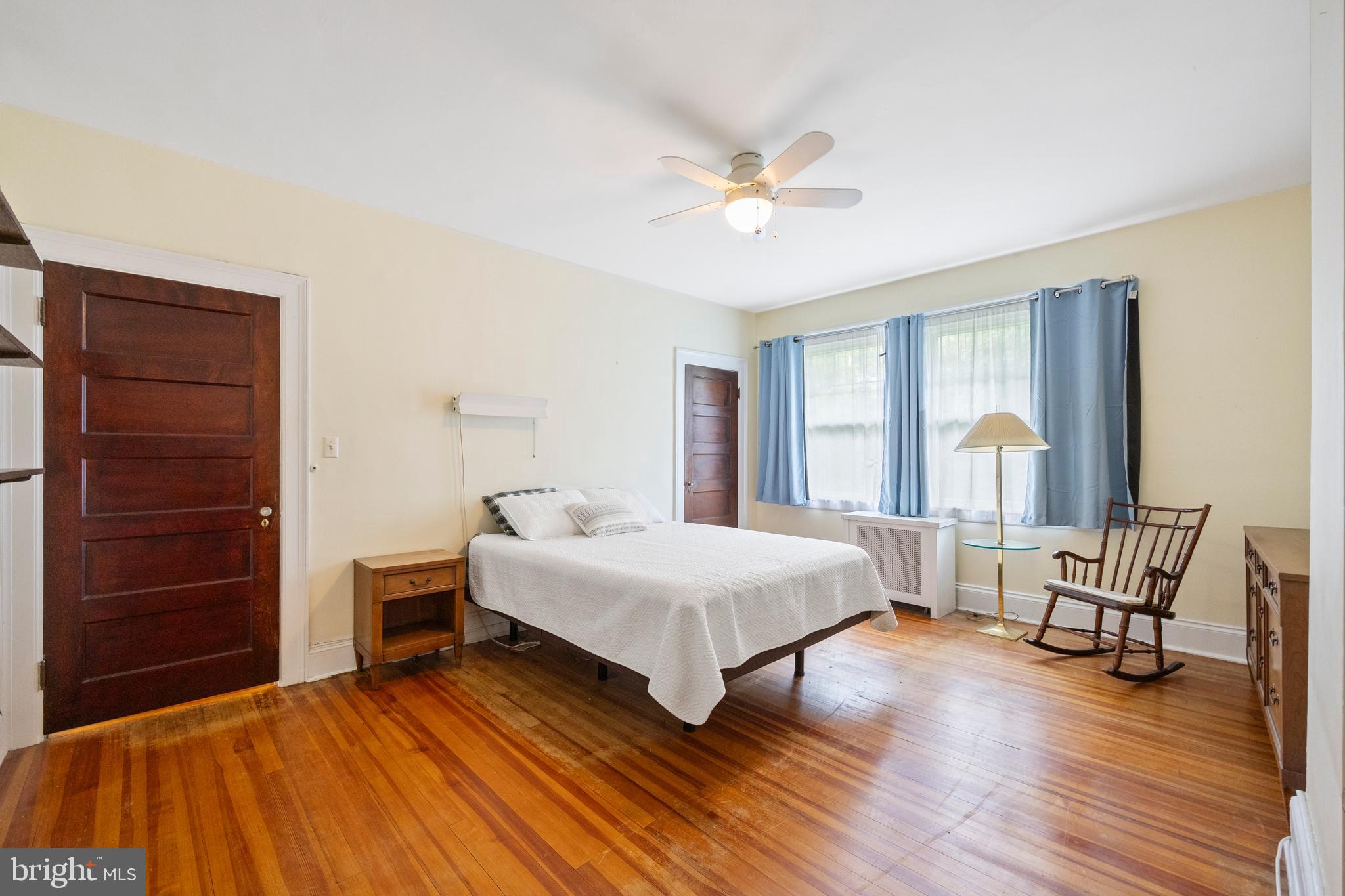 3936 Cloverhill Road Baltimore, MD 21218 - Photo 16 of 37 a bedroom with a bed and a large window