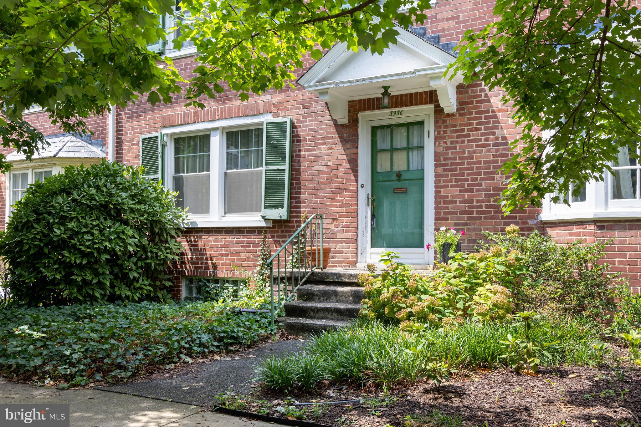 3936 Cloverhill Road Baltimore, MD 21218 - Photo 2 of 37 a front view of a house with garden